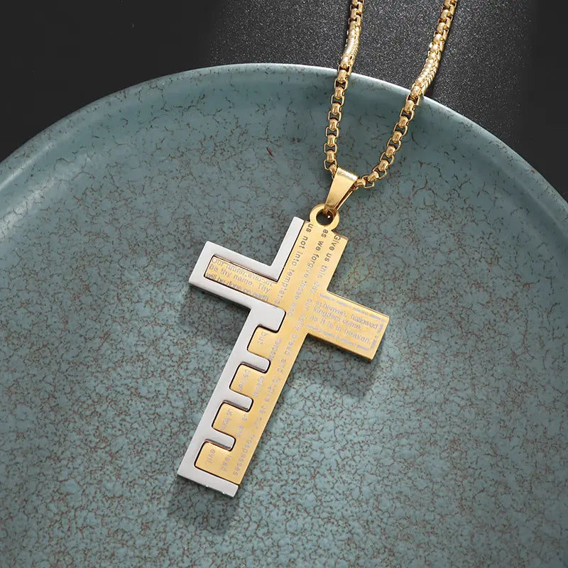 Dije de la Cruz del Padre Nuestro en dos tonos, oro dorado y acero plateado, grabado con micro-láser de alta definición. Joyería fina y amuletos de protección para caballero en México.